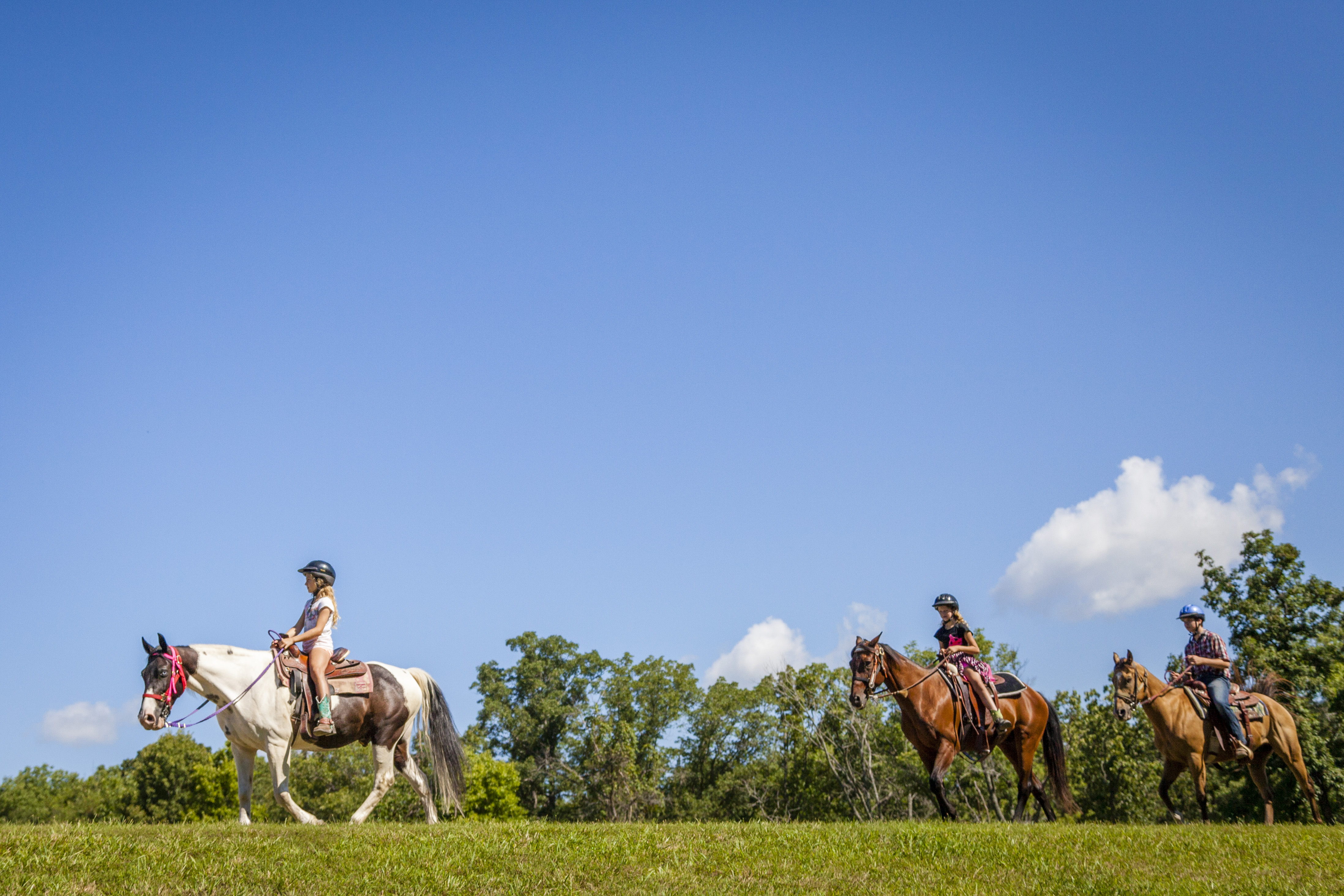 Horse backing riding at the lake