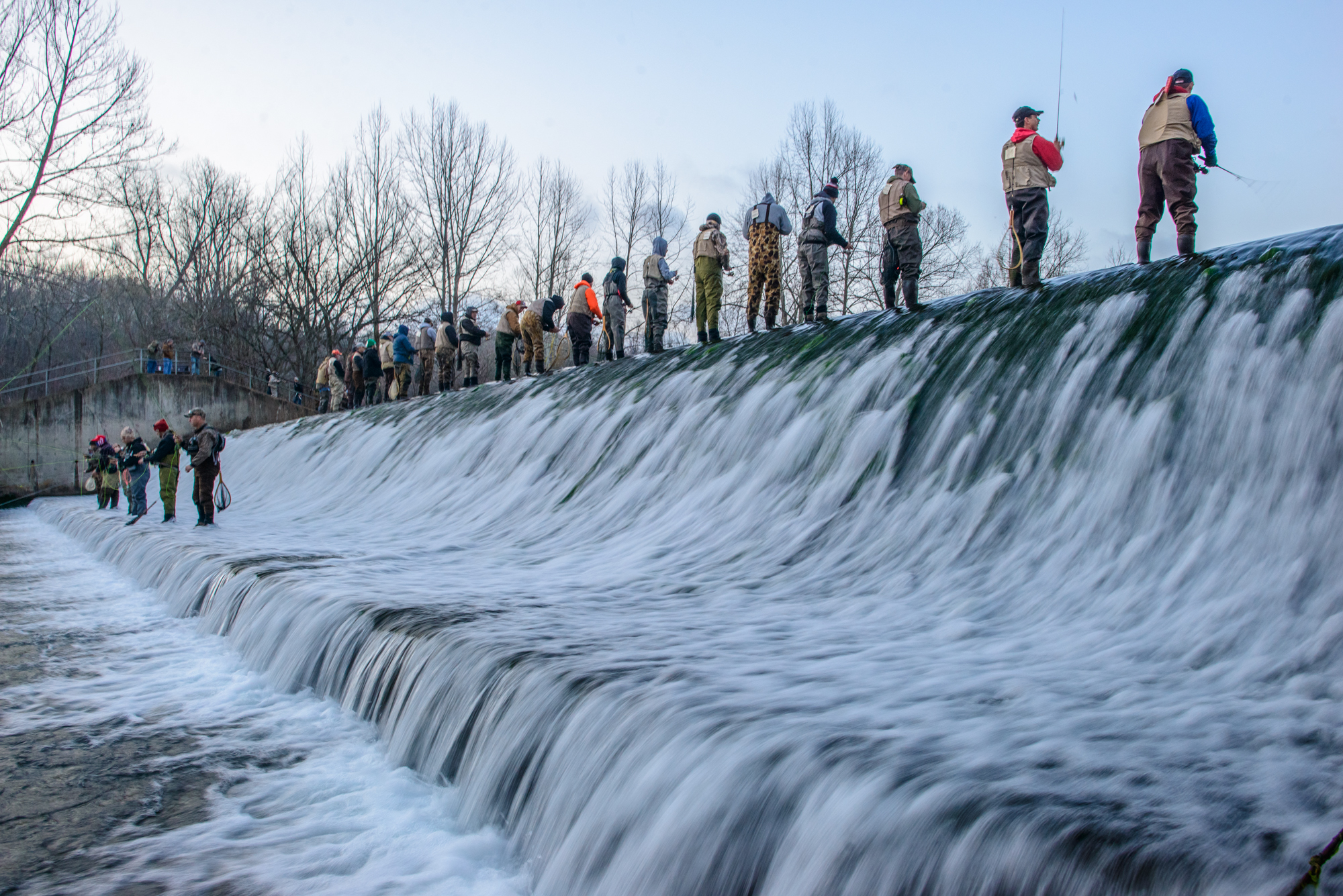 many people participating in a fishing tournament