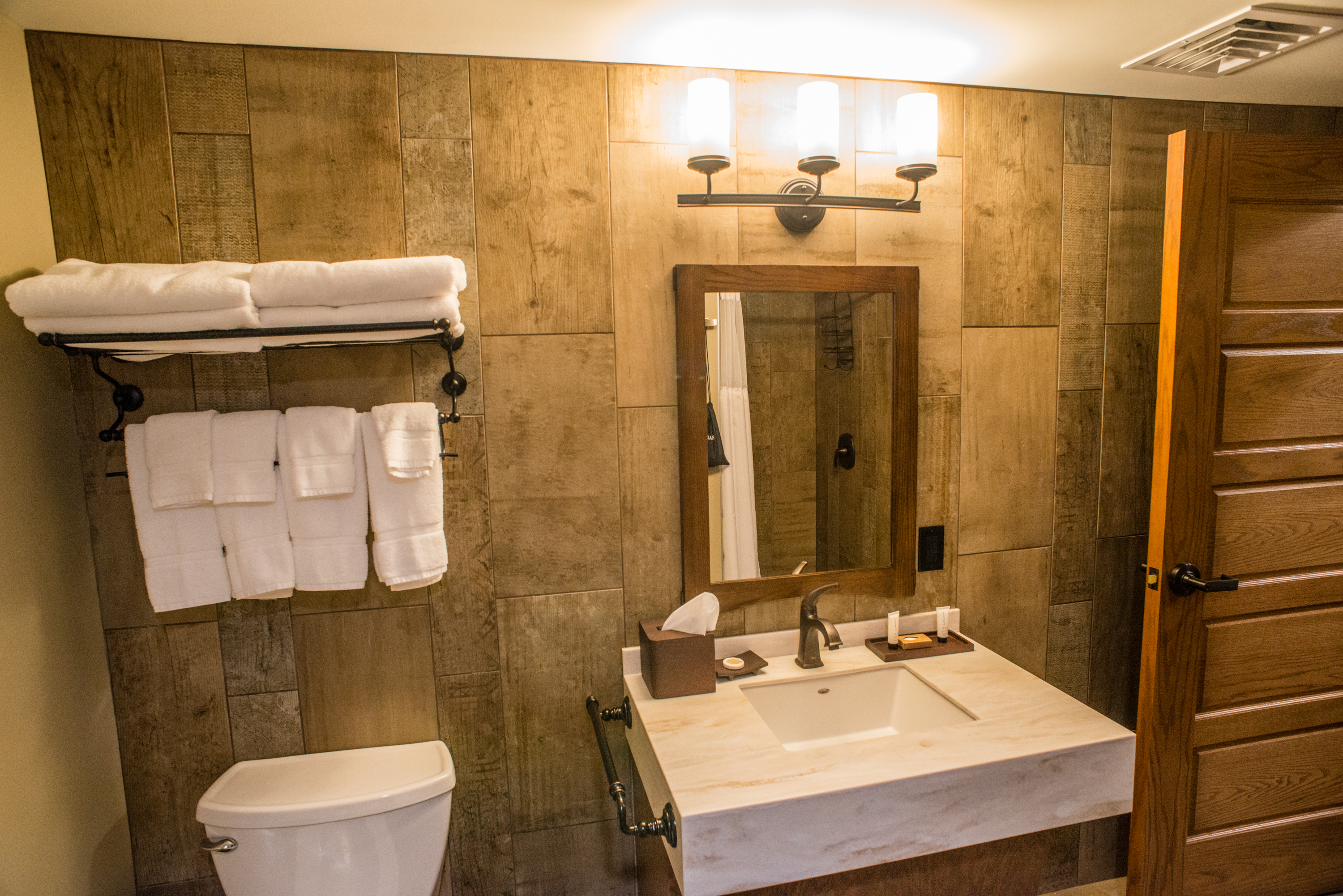 Bathroom with stone walls and marble sink