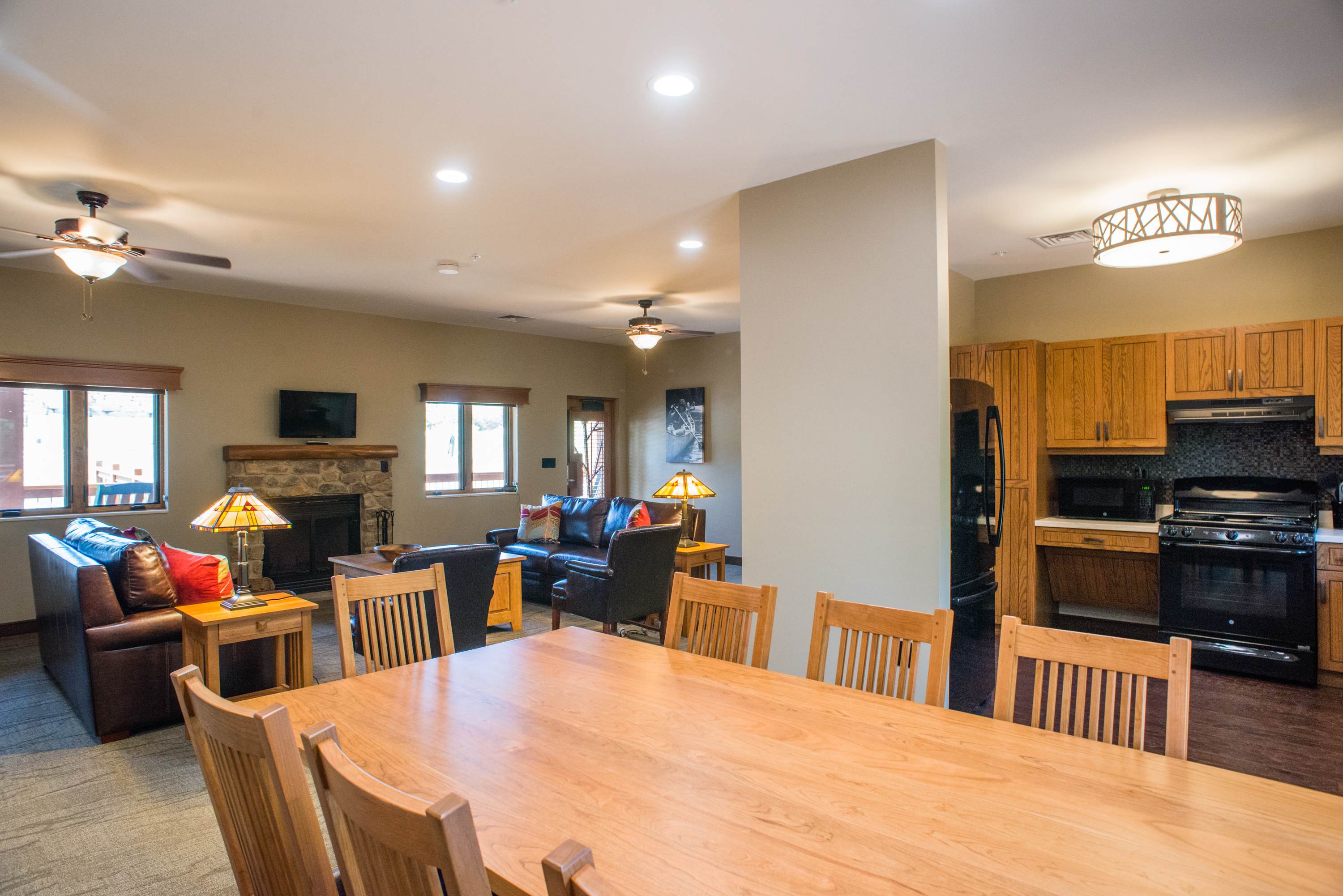 a dining room with an 8 person dining table