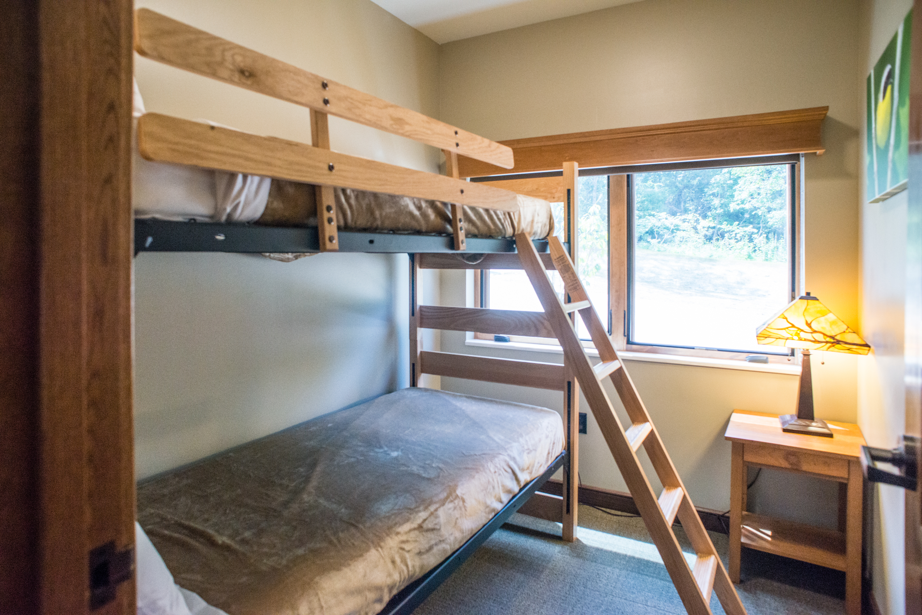 a room with twin-sized bunk beds