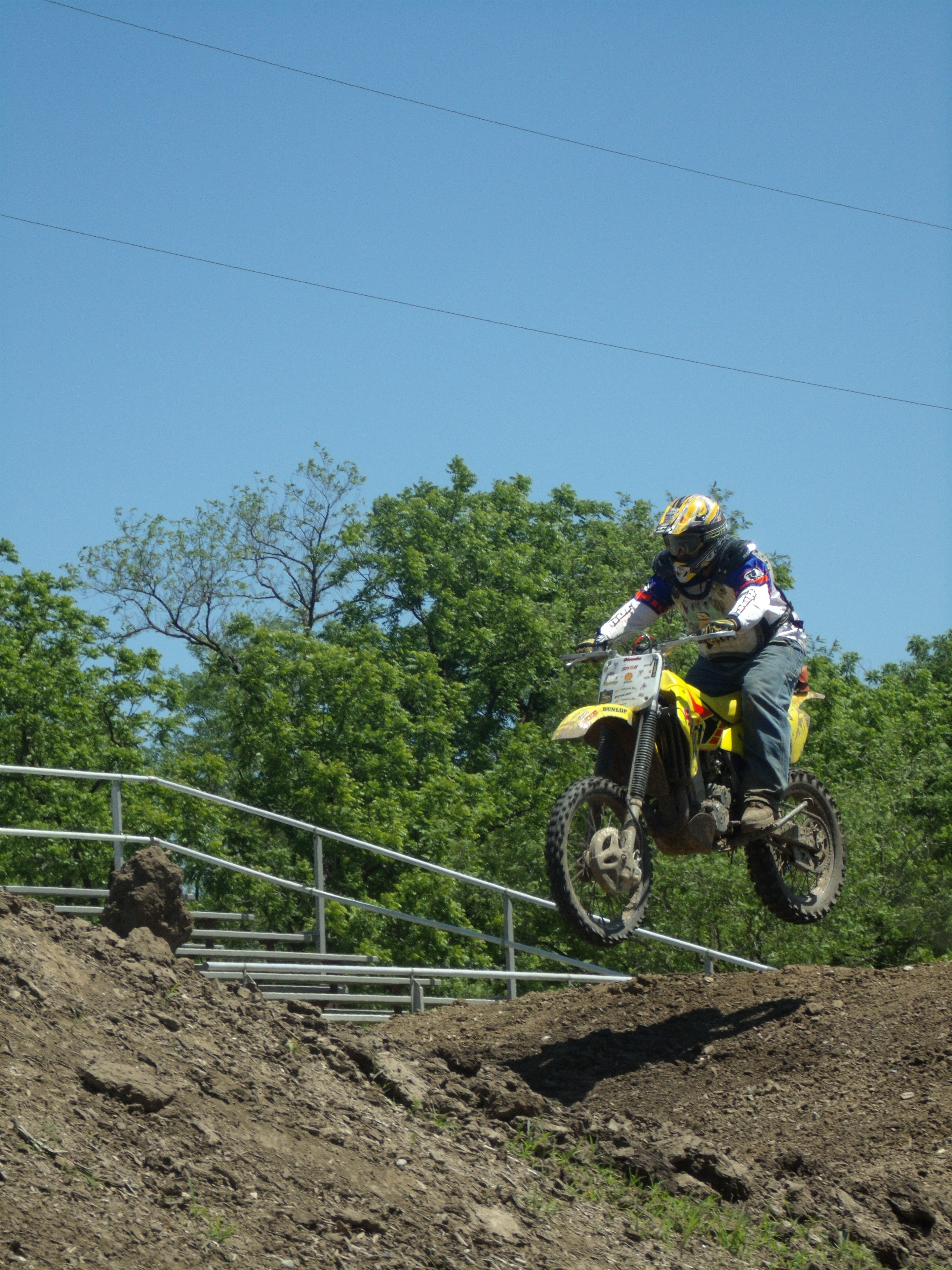 A person on a dirt bike doing tricks