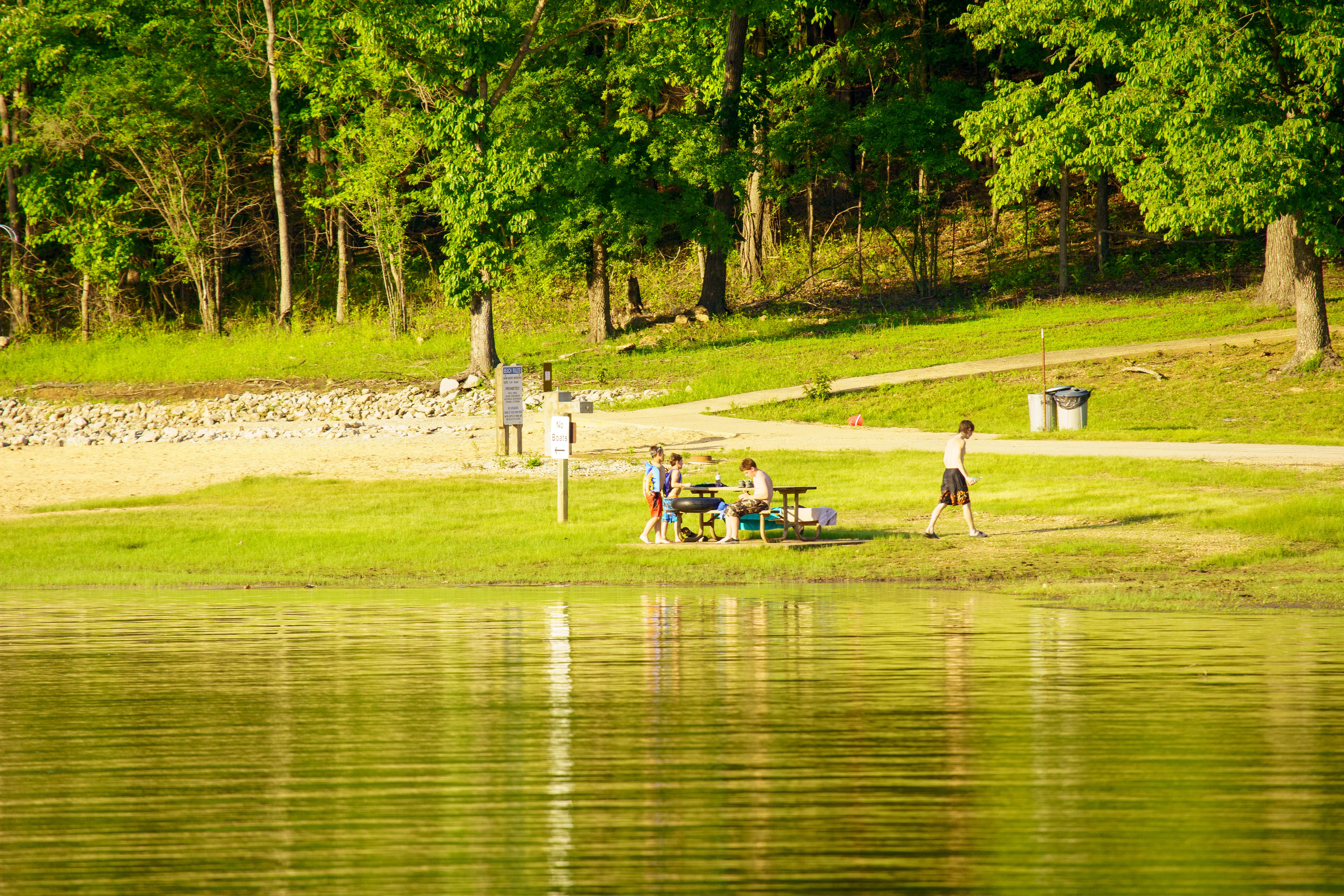 People gathered by the shore