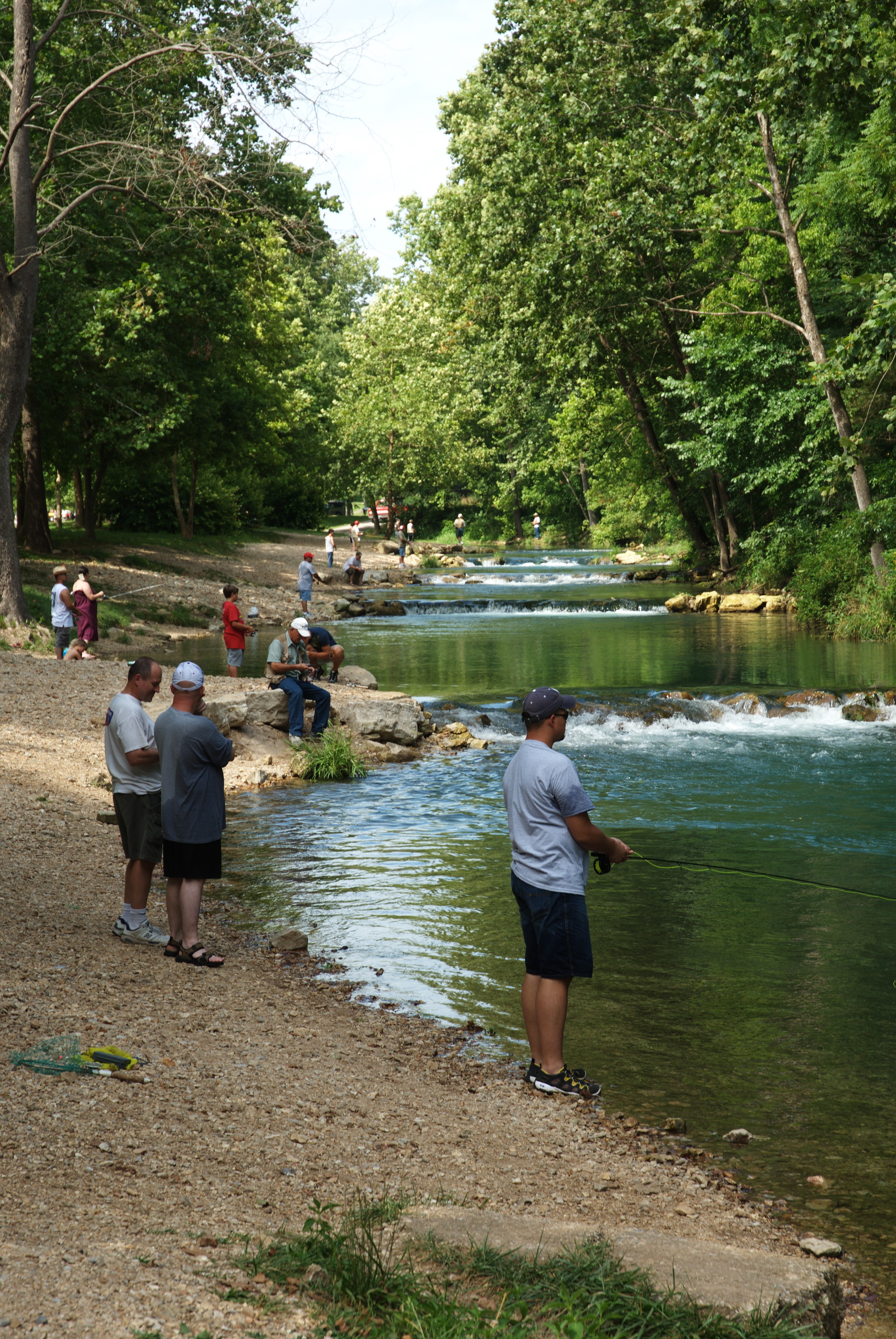 many people by the river