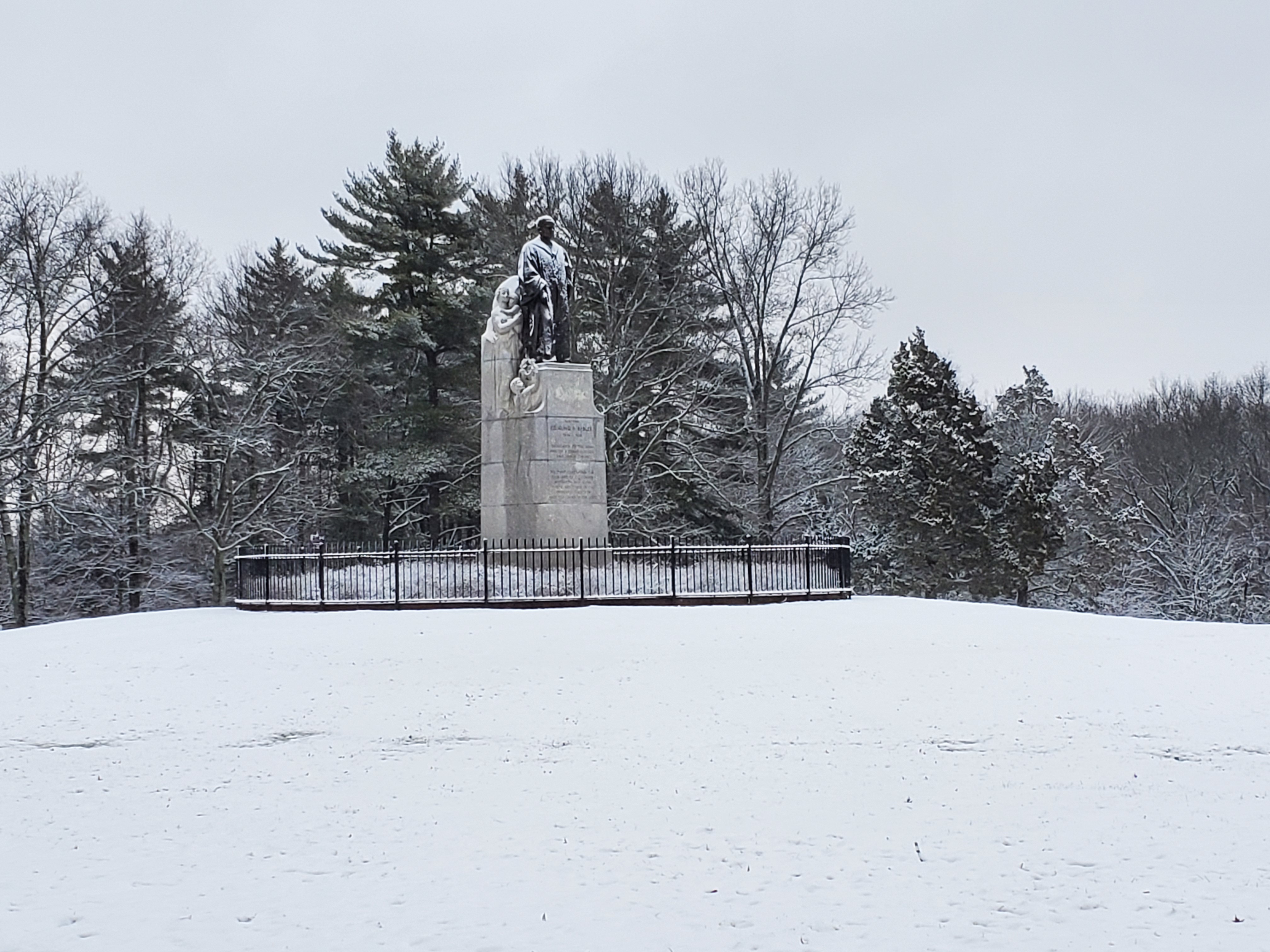Dr. Edmund A. Babler Memorial Statue in the snow