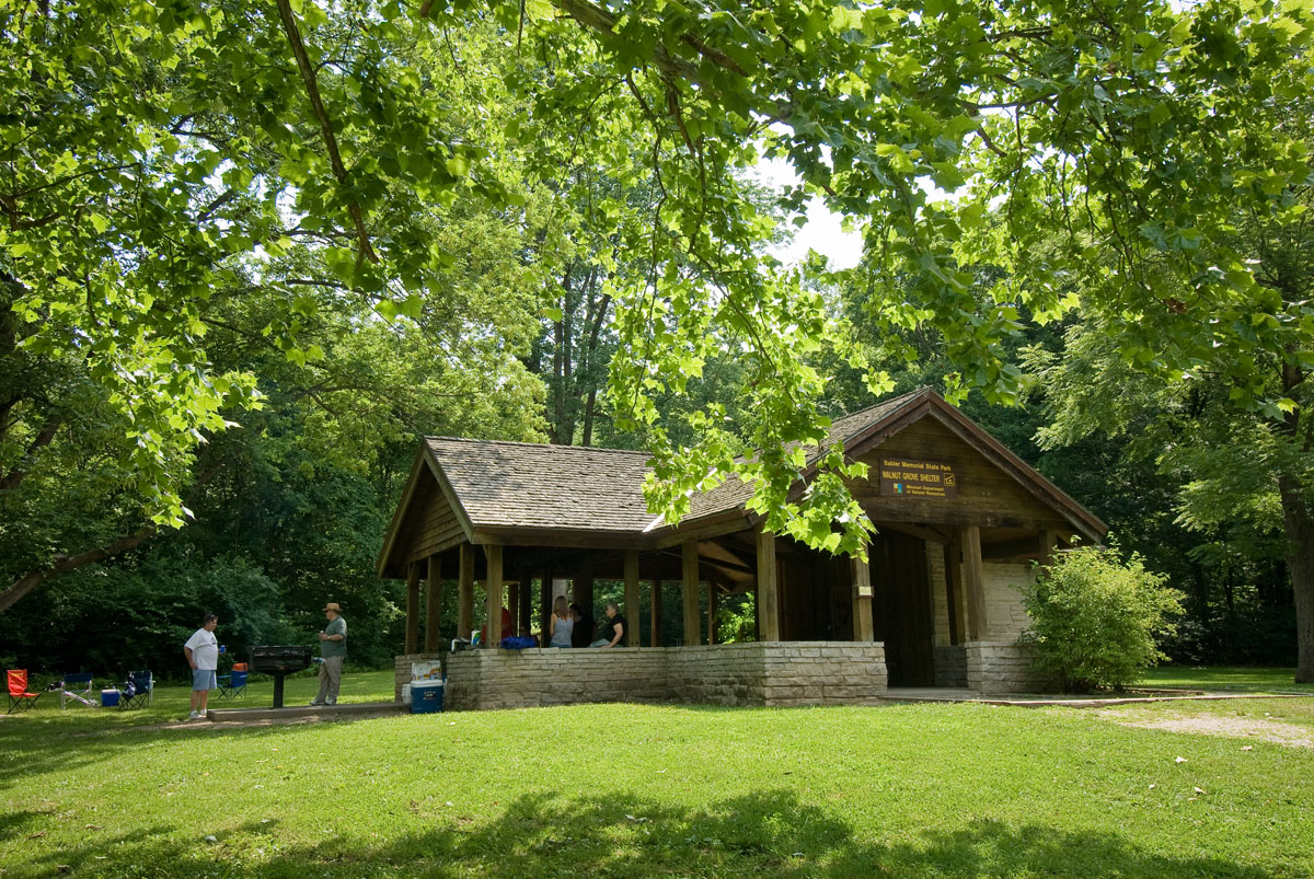 Picnic shelter with a grill