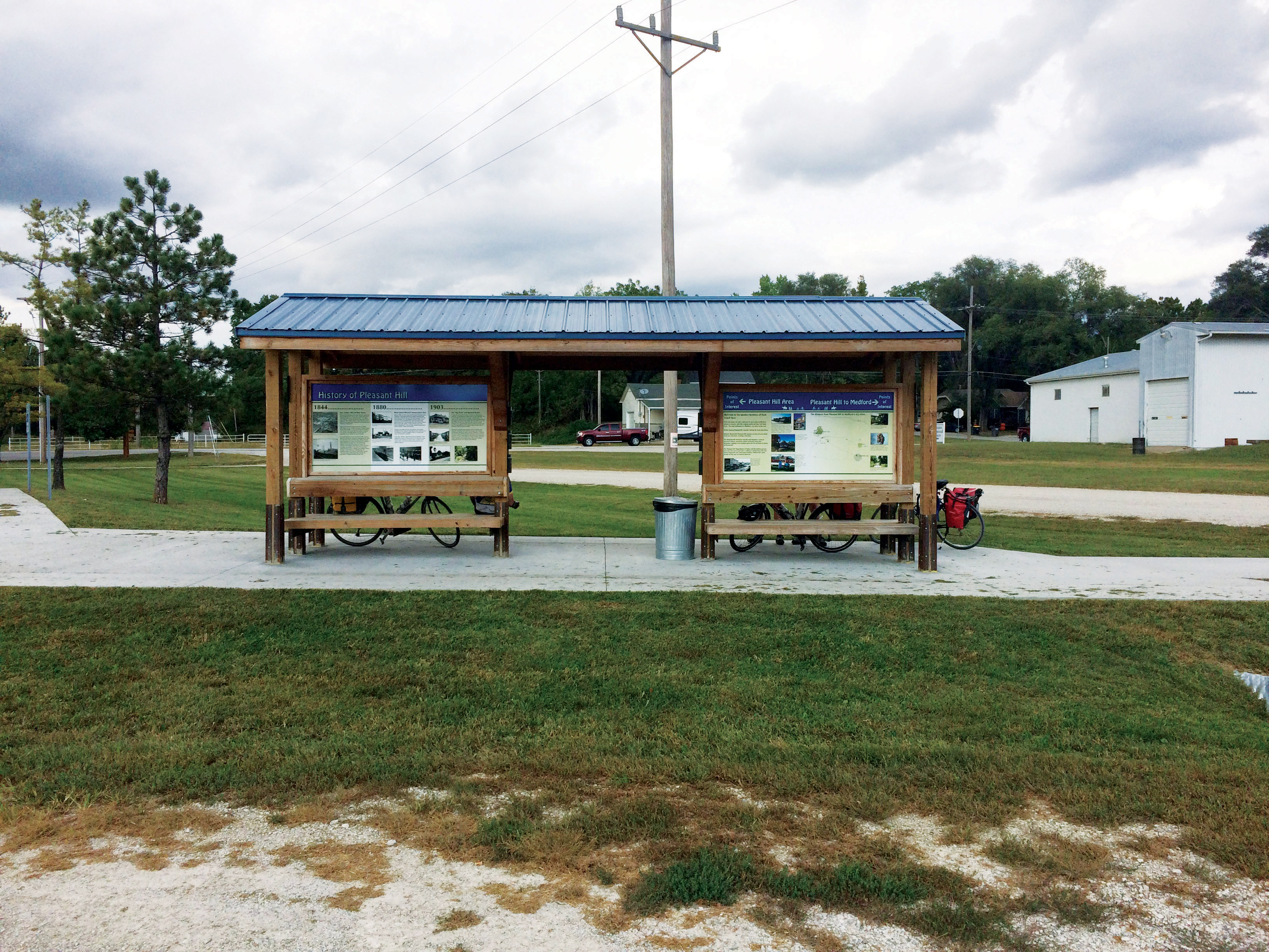 A shelter with benches and information signs