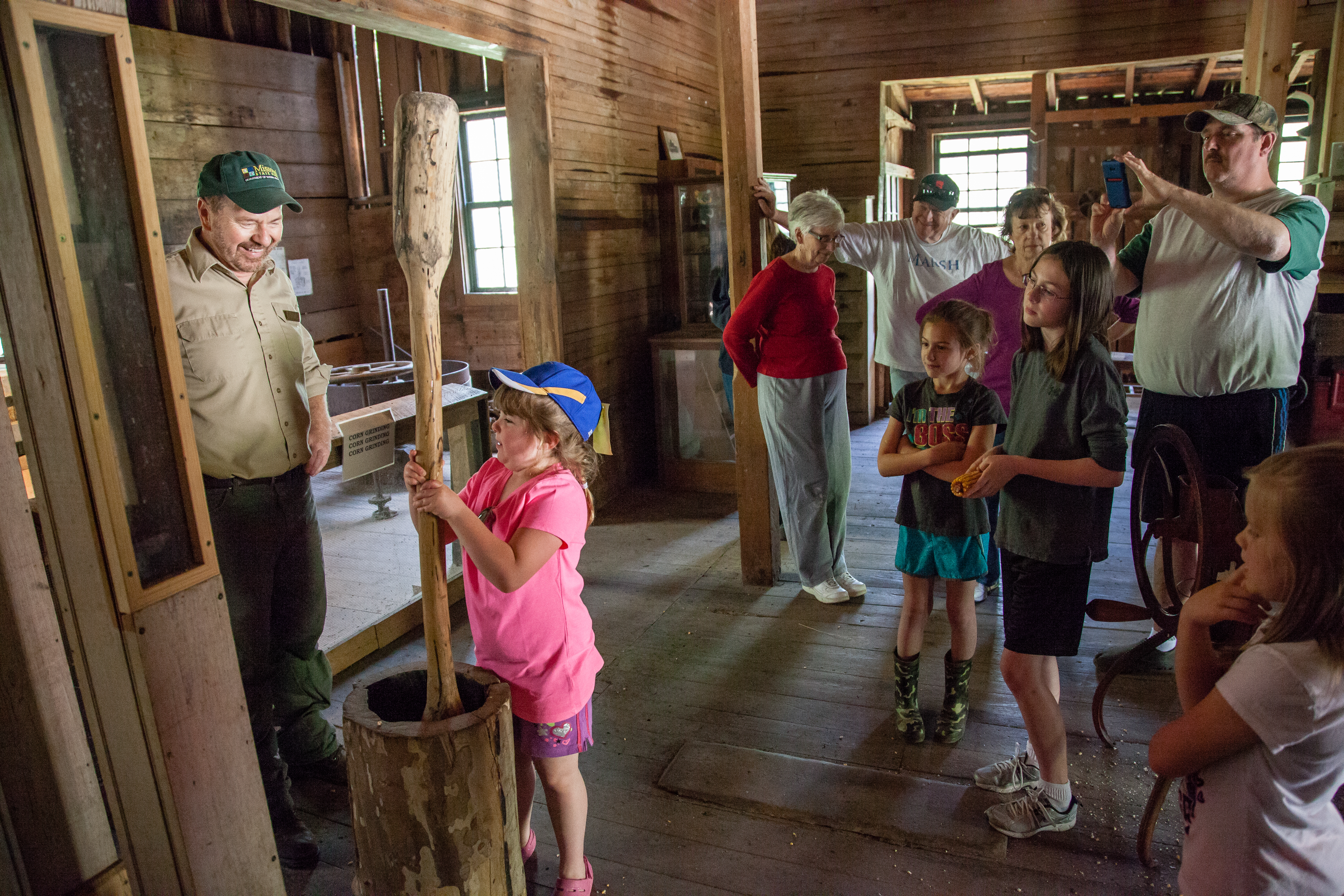 A child churning butter