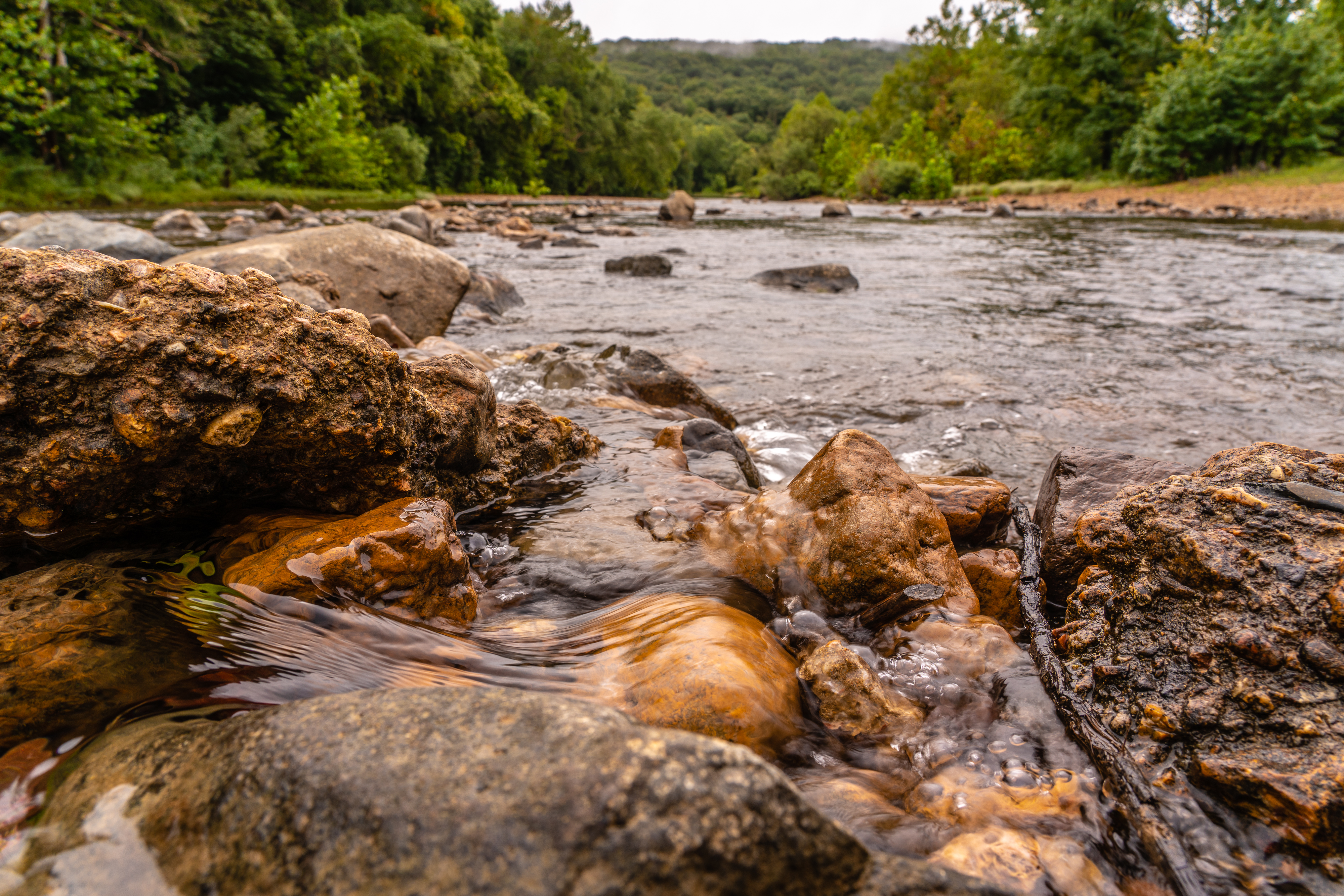 Water rushing over the rocks in a stream.