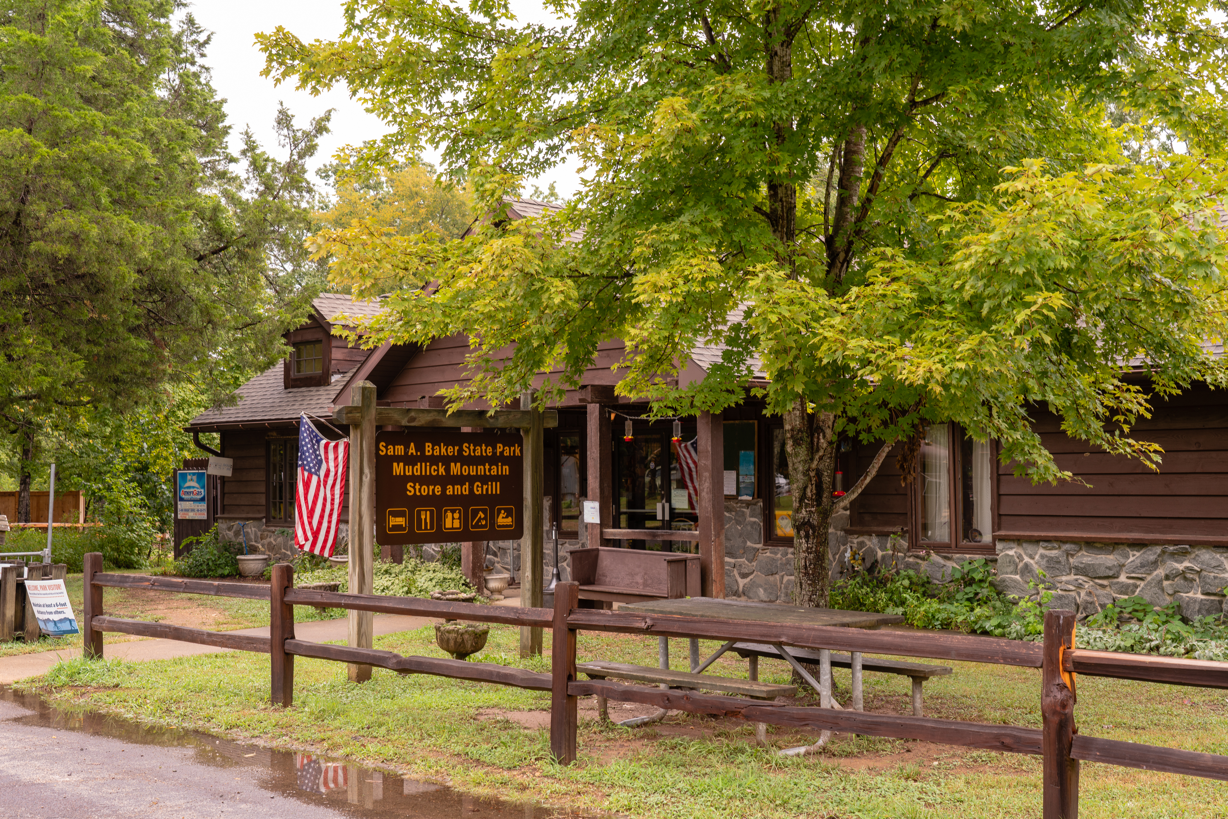 Wood building known as the Mudlick Mountain Grill.
