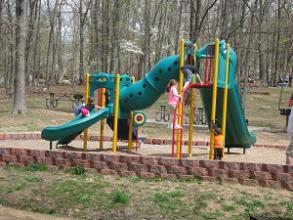 new playground equipment with various slides