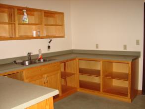 sink and cabinets inside shelter