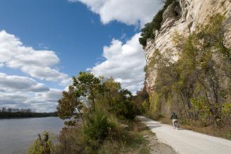 A paved trail along a river