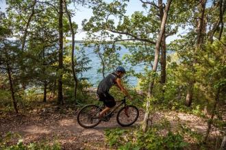 A person biking on a trail