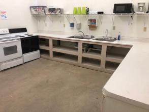 Kitchen inside enclosed shelter