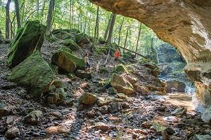 A rocky trail leading into a cave