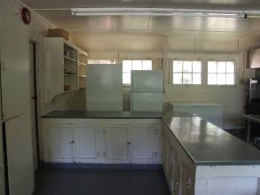 Freezers and refrigerator in dining hall kitchen