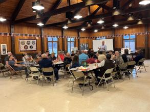 Lt. Gov. Mike Kehoe speaks with veteran hunters.