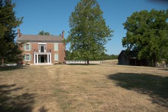 two story, red brick home