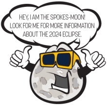 A cartoon moon with arms, a face and eclipse viewing glasses says, &"Hey, I am the spokes-moon! Look for me for more information about the 2024 eclipse."