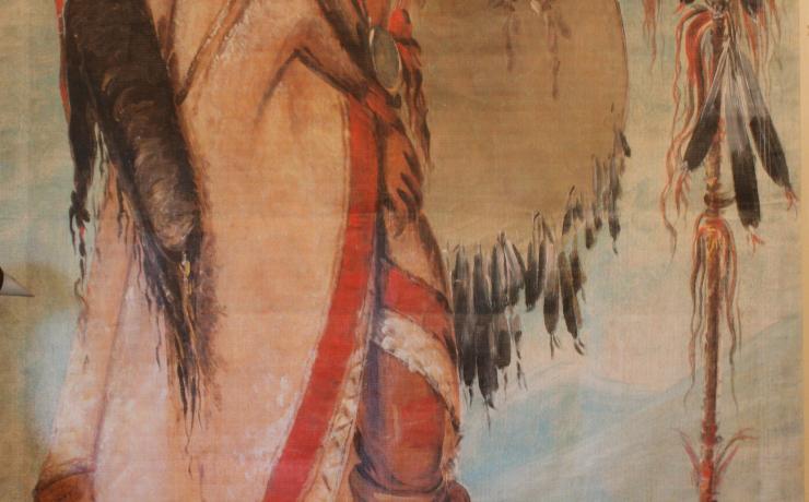 A painting of a native american holding a spear
