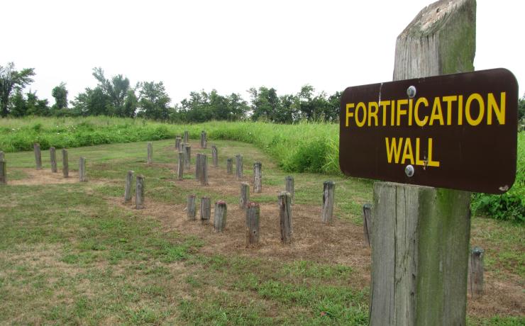 A sign post that reads Fortification Wall