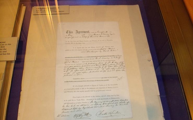 A contract in a display case