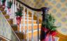 A staircase decorated for christmas
