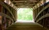Inside of a wooden covered bridge