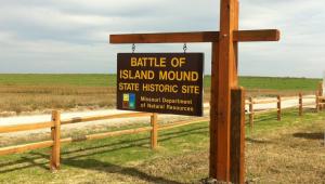 Welcome sign for the Battle of Island Mound State Historic Site