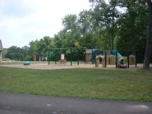 Playground equipment with swings and slides