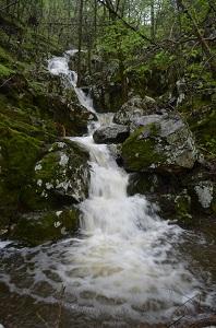 waterfall flowing through rocks