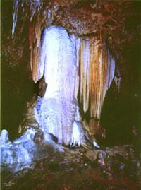 Stones hanging off the ceiling of a cave