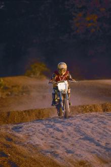 Man riding dirt bike on motocross track at Finger Lakes State Park