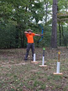 A person shooting a bow