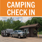 A truck pulling a camper