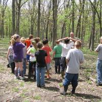 a group of kids on a nature hike